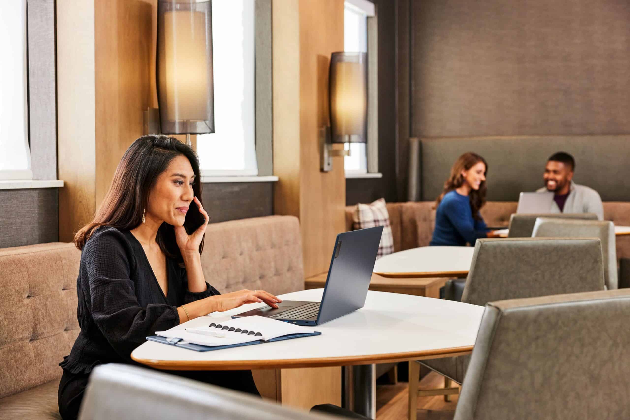 Woman working at the communal table